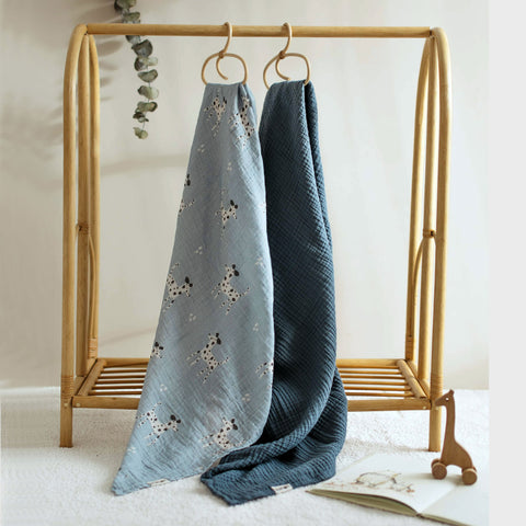 Dalmatian and navy blue swaddles hanging side by side