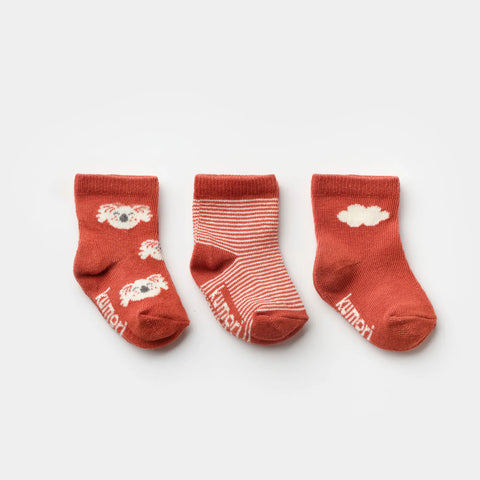 3-pack of terracotta baby socks with koala, stripe, and cloud designs
